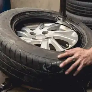 removing automotive car tire from rim