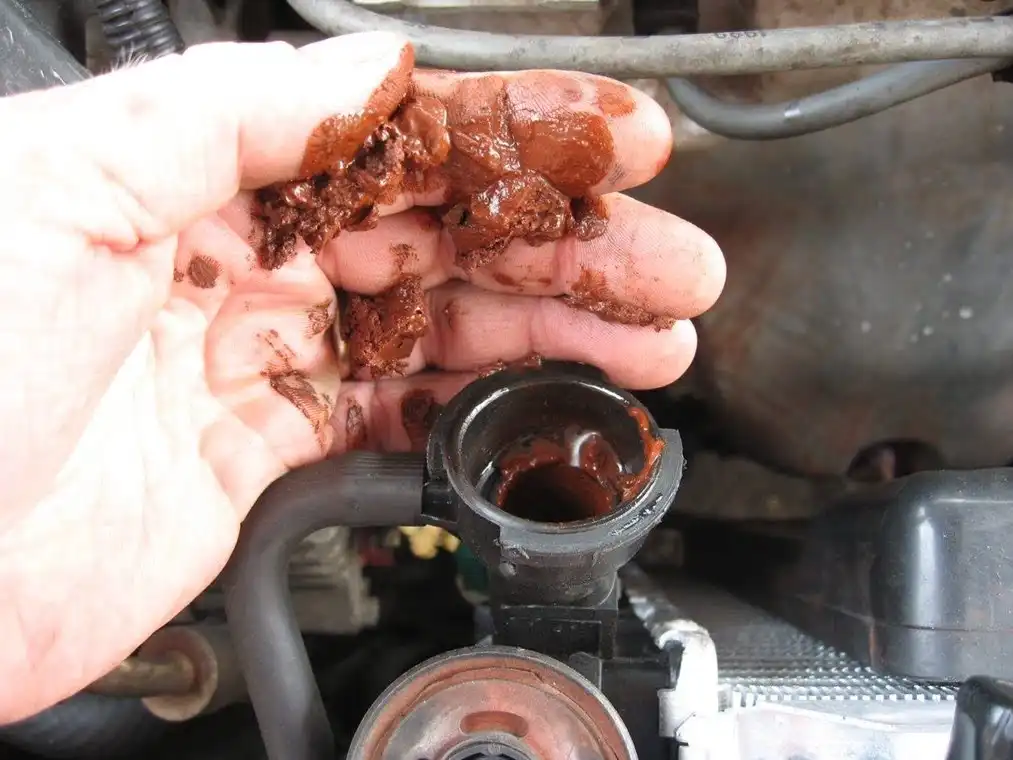 Image 6: cooling system loaded with rust and sludge