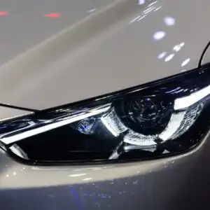 projector headlight of a white vehicle