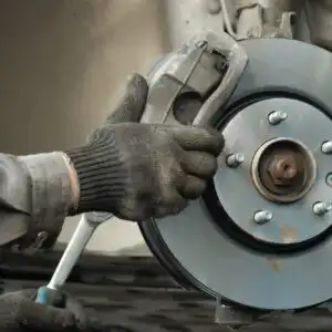 how to compress a brake caliper