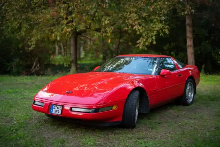 beautiful shot of a red chevy corvette c4